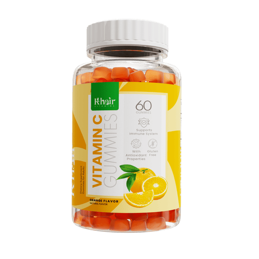 A bottle of Khair Vitamin C Gummies with a yellow label, containing 60 gummies that support the immune system and have antioxidant properties, marked as gluten-free, in orange flavor.